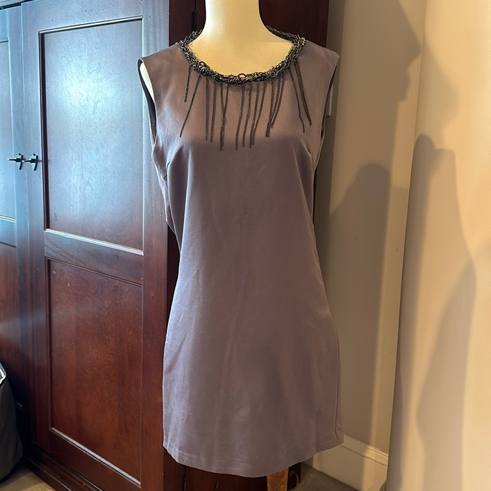 Cool party dress with built in jewelry. Bought it at a boutique. Size S.
